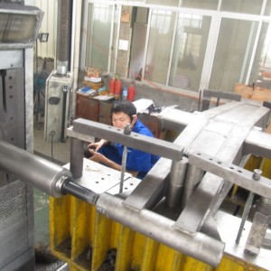 Machining of loader arm